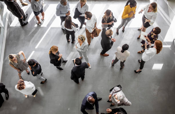 Business people at a conference, seen from above